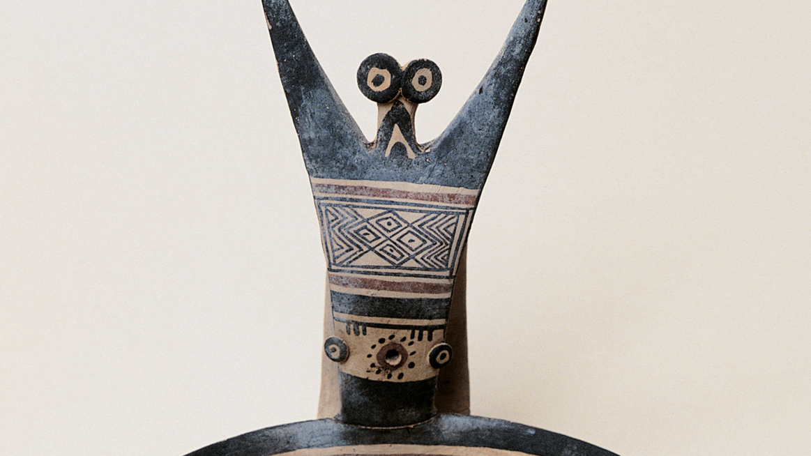 Daunian kyathos: A 2,700-year-old ceramic cup from Italy decorated with an exuberant-looking, bug-eyed fellow