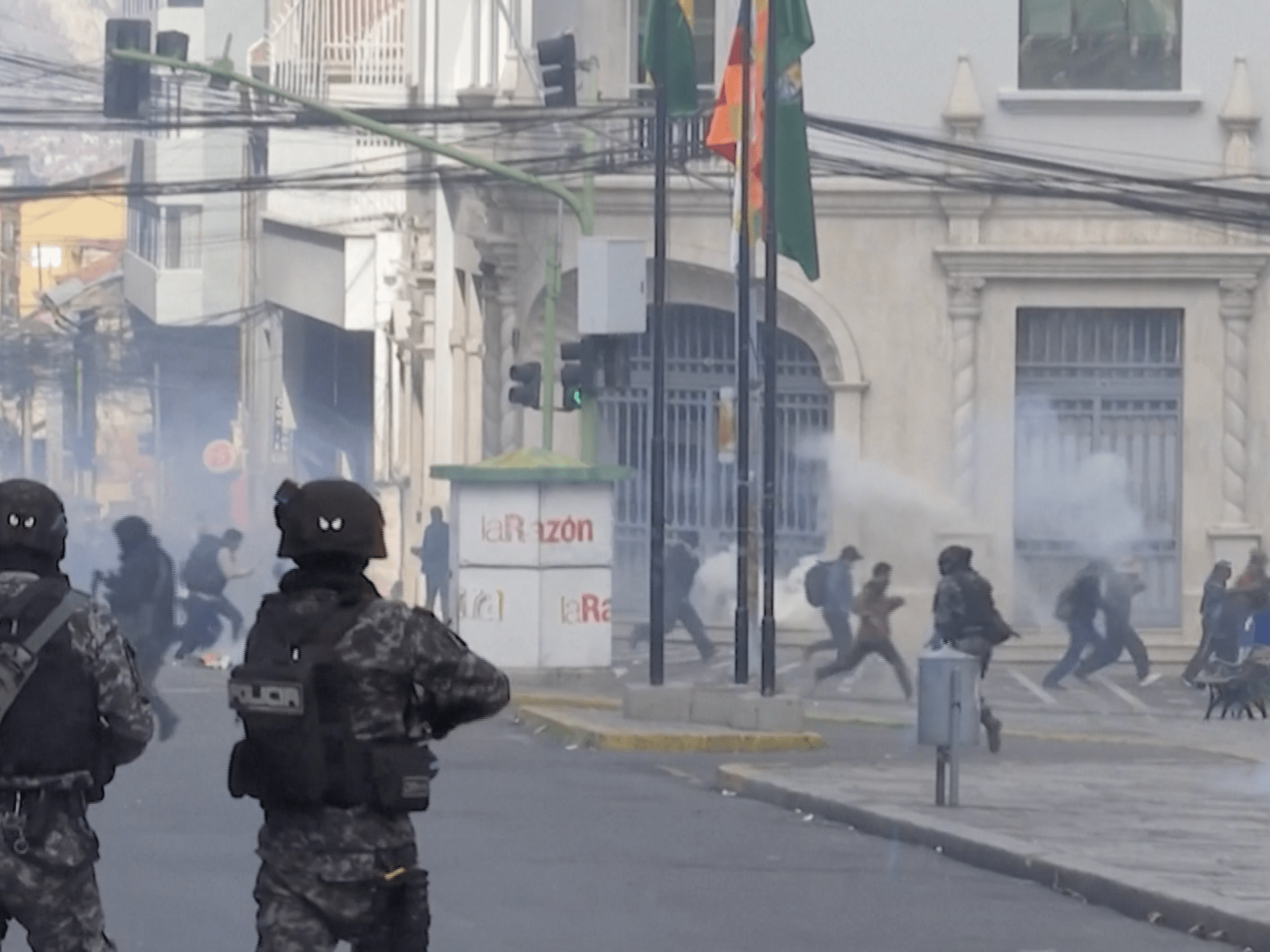 Bolivian miners clash with police demanding president resign