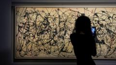 Jackson Pollock painting sells for record $181m at auction