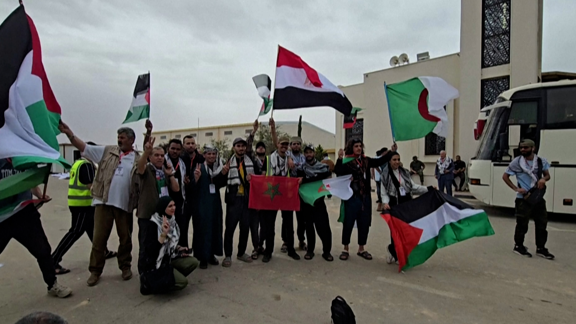 Activists take part in a land convoy from Libya to bring aid to Gaza