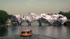 Timelapse footage shows ‘giant cave’ inflating on Paris bridge
