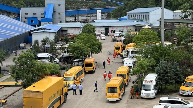 China lowers coal mine disaster death toll to 82