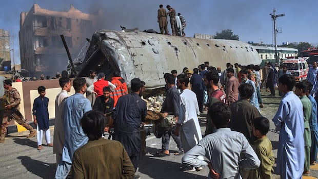 Suicide bombing near a railway track in southwest Pakistan kills at least 23 people