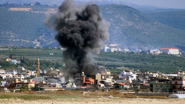Israeli strike on village in eastern Lebanon kills 12, as troops try to push farther north