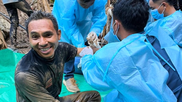 5 people found alive after a week trapped in a cave in central Laos