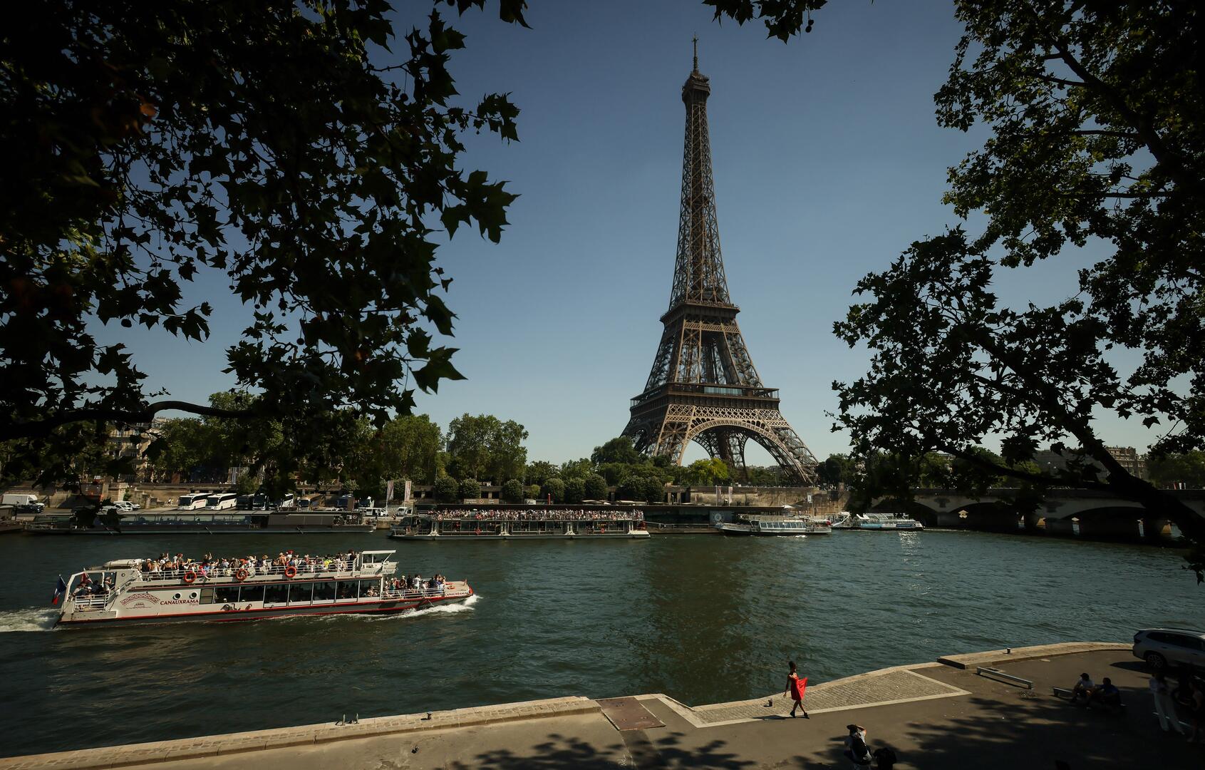 Parisians defy swimming ban to cool off as record heat hits Europe