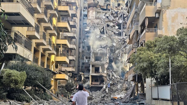 Israel strikes Beirut suburb, at least 14 killed across southern Lebanon