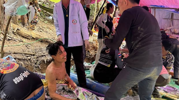 Rescuers free 4 men trapped in flooded cave in Laos, search for 2 still missing