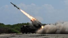 Japan defence minister denies militarism and criticises China’s ‘huge arsenal’
