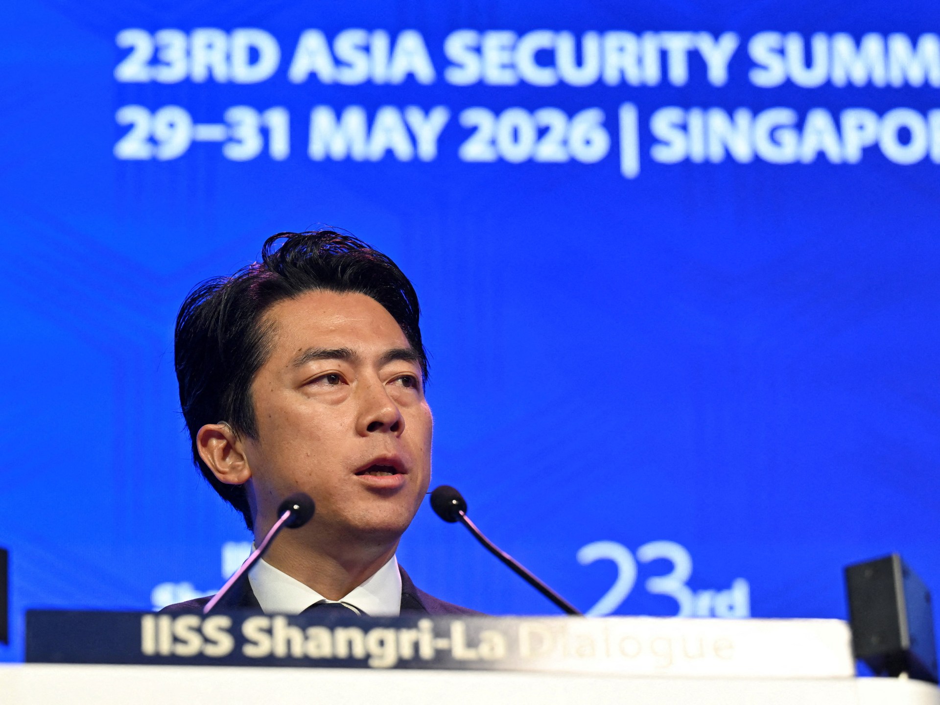 Japan rejects ‘new militarism’, says China is rapidly arming
