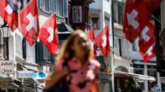 Switzerland votes on plan to cap population at 10 million