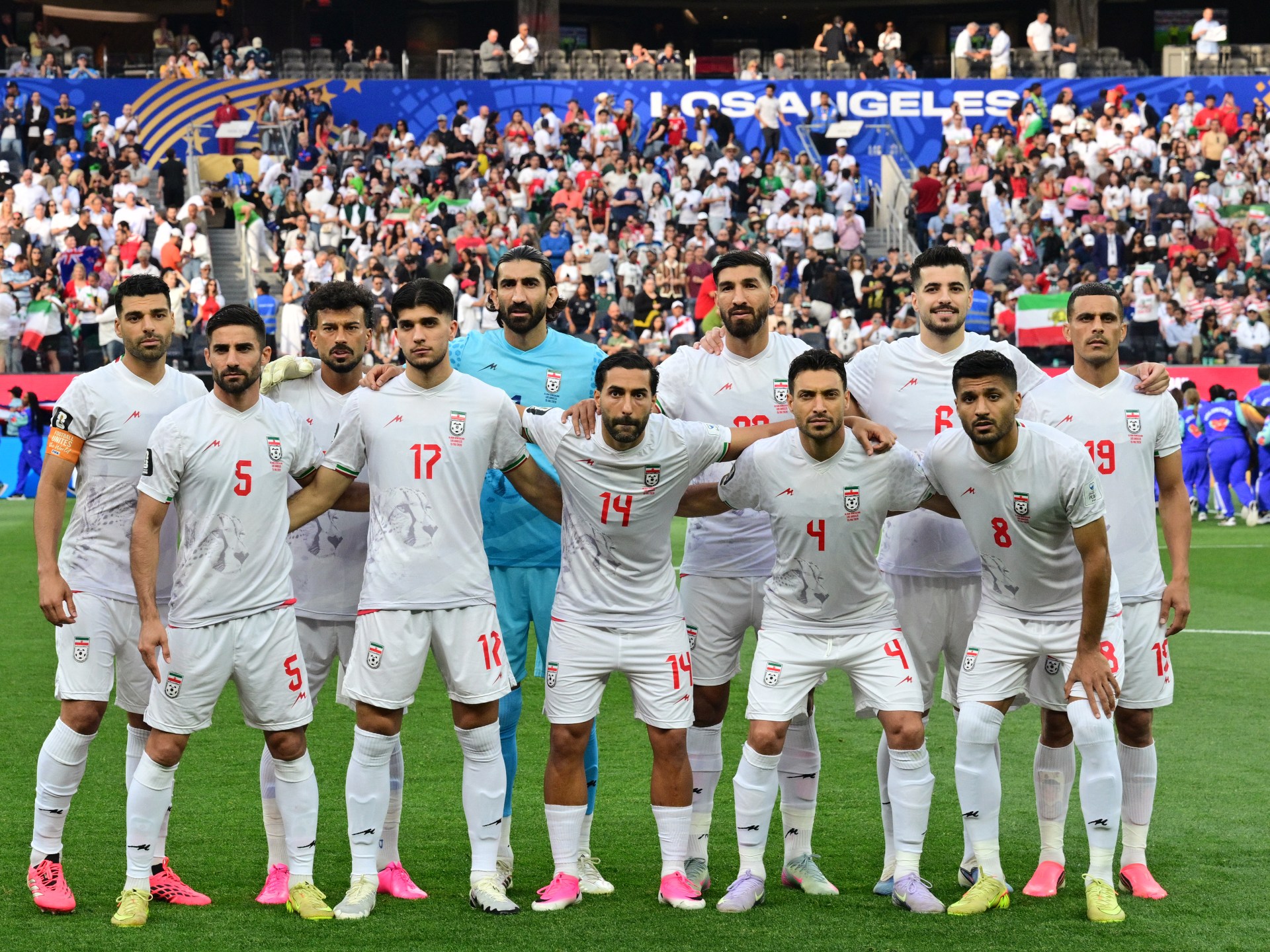 Football upstages politics as Iranians rally behind their team at World Cup