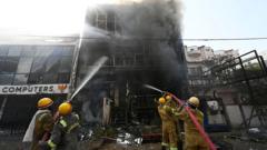 Inquiry ordered after building fire kills 15 in north India city