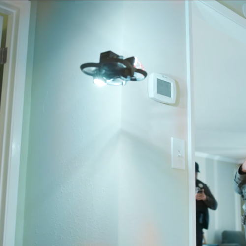 Odd police video shows drone removing knife from motionless suspect
