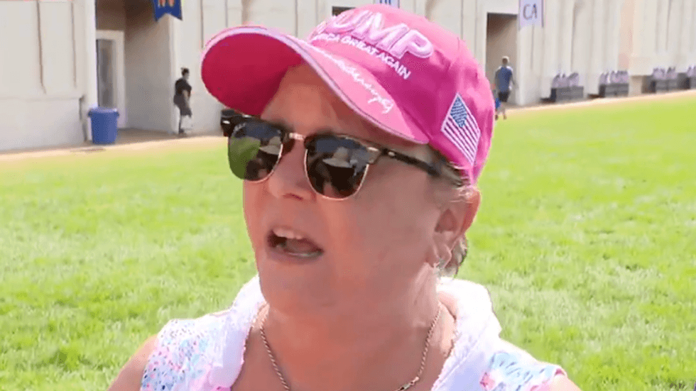 Trump fan dunks herself in baptismal pool at state fair to escape searing heatwave