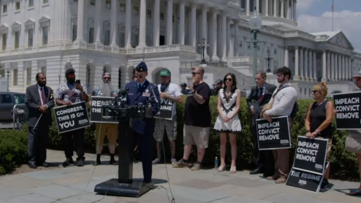 US Air Force Maj. Jason Watson arrested after calling for Trump’s impeachment on Capitol steps