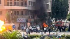 Bomb explosions injure 18 in Damascus during Macron’s visit