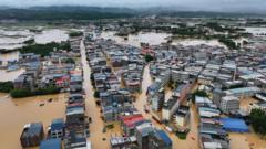 ‘The water just came so fast’: Typhoon triggers floods and rare tornadoes in China