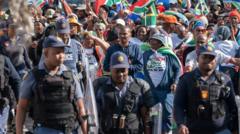 Special police team to investigate killing of an anti-migrant leader in South Africa