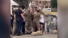 Why are Ukraine’s military recruiters facing violence in their own country?