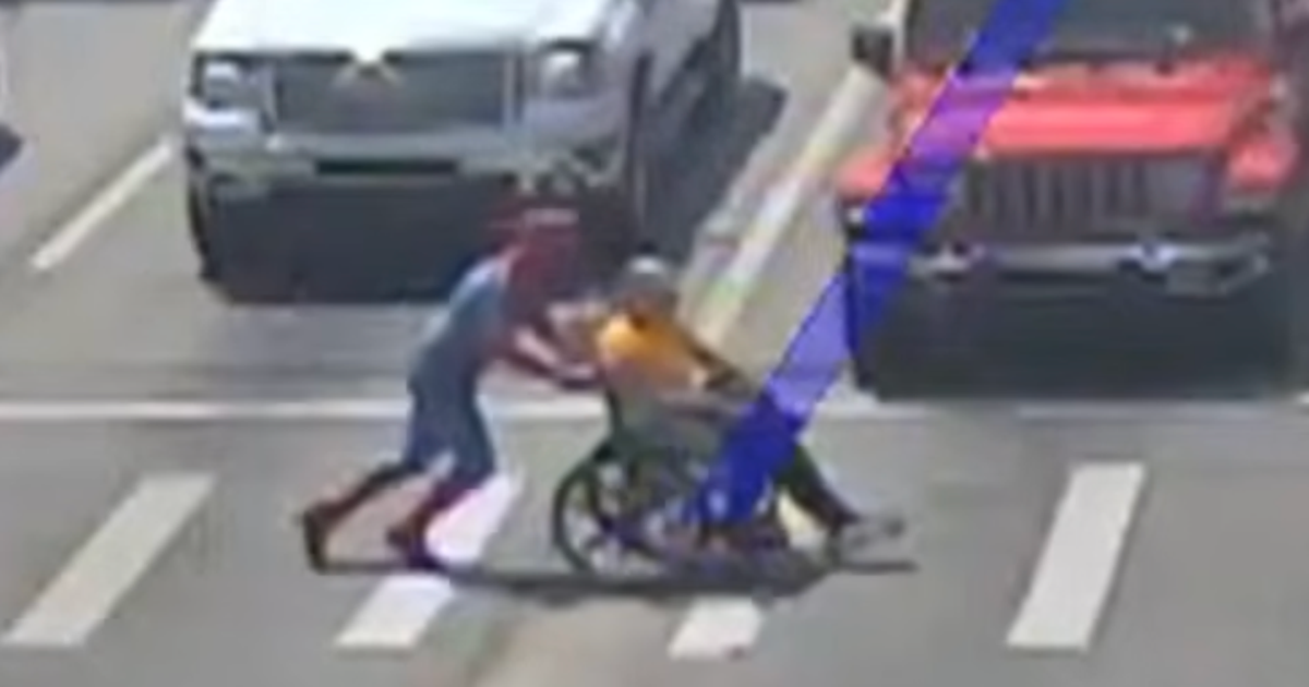 Spider Man Rescues Man Using Wheelchair From Traffic