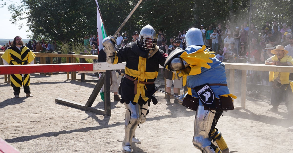 Fighters Battle With Swords, Axes And Shields At Medieval Combat World Championship