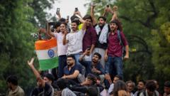 India’s ‘cockroach’ protest called off after education minister quits