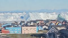 Watch: Giant iceberg turns over near  Greenland’s coast