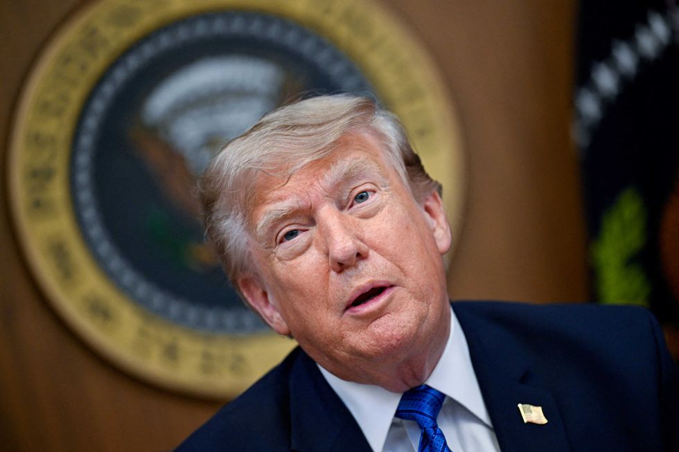 Trump kisses gold Jesus as AI dump draws scorn: ‘Now I need brain bleach’