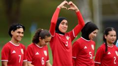 Banned from football at home, Afghan women’s team reunite 8,000 miles away