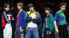 ‘Put your phone down’: K-pop band weighs in on concert etiquette