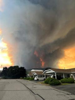 State of emergency declared as fast-moving Canada wildfire doubles in size