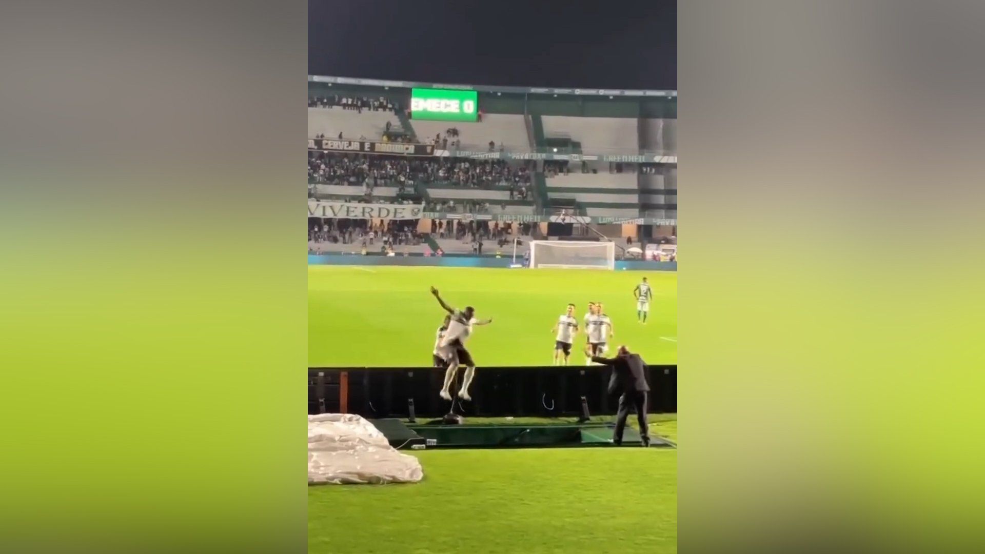 Brazilian player falls into tunnel celebrating goal