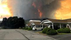 ‘Total incinerated destruction’: Canada wildfire evacuees wonder if they still have homes