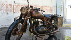 Danube river’s low water levels reveal remains of WWII soldiers and motorcycle