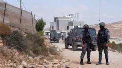 Activists try to deliver aid to Palestinians in homes besieged by Israeli settlers
