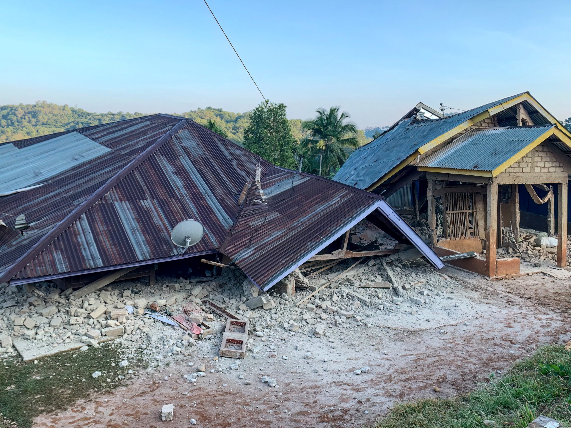 At least two killed as magnitude 7.7 quake hits Indonesia