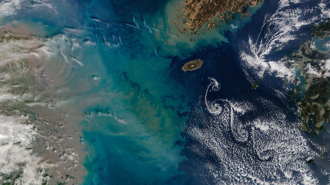 Giant underwater plume blasts into swirling cloud ‘street’ in the East China Sea — Earth from space
