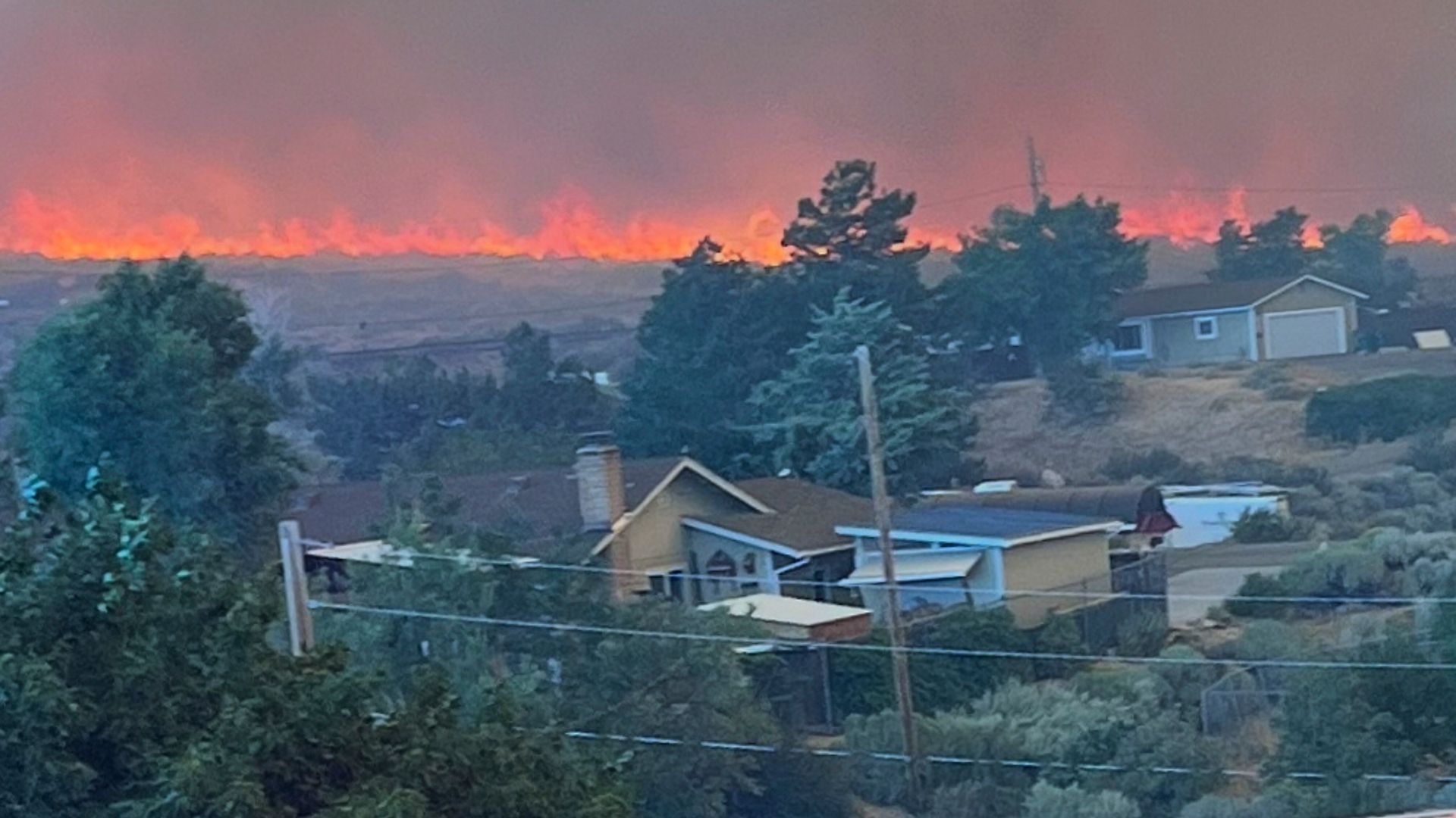 ‘Human-caused’ wildfire rips through major city in Nevada – as 90,000 residents told to flee