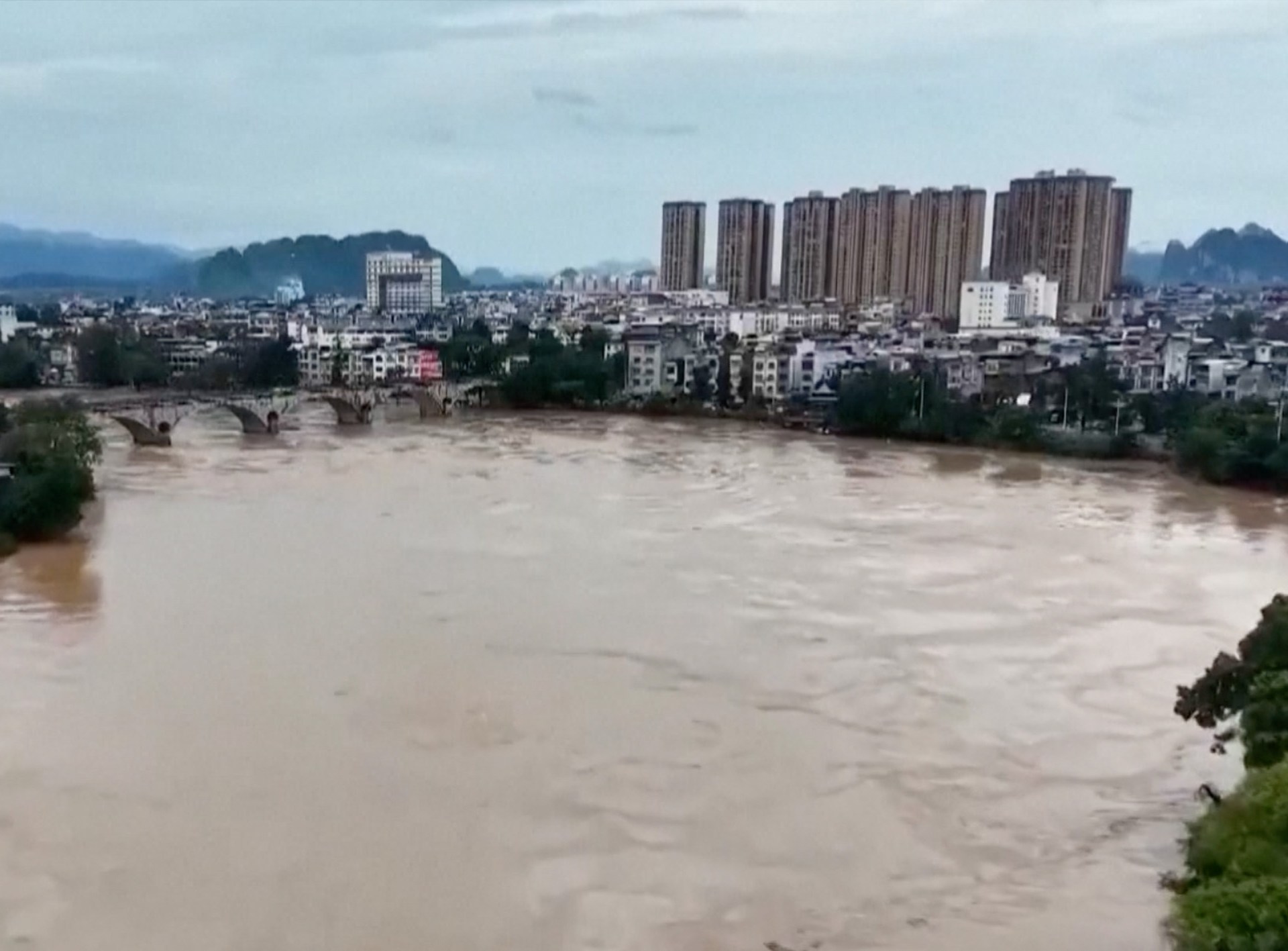 Rain and flooding from Typhoon Narra hits China and Vietnam