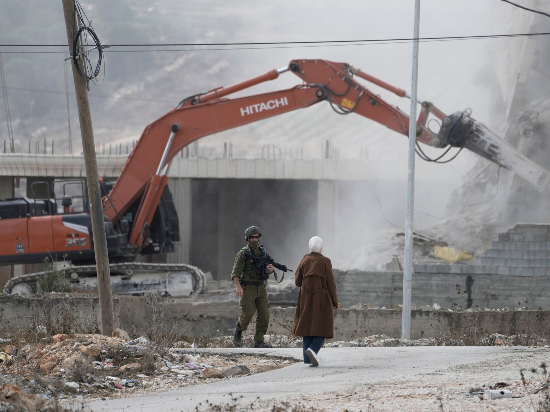 Israeli forces raze West Bank homes as EU weighs ban on settlement goods