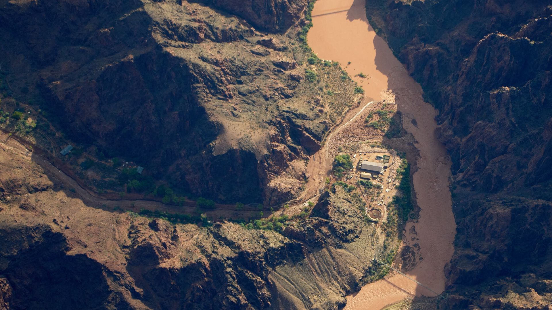 At least two dead and 80 rescued after flash flood hits Grand Canyon