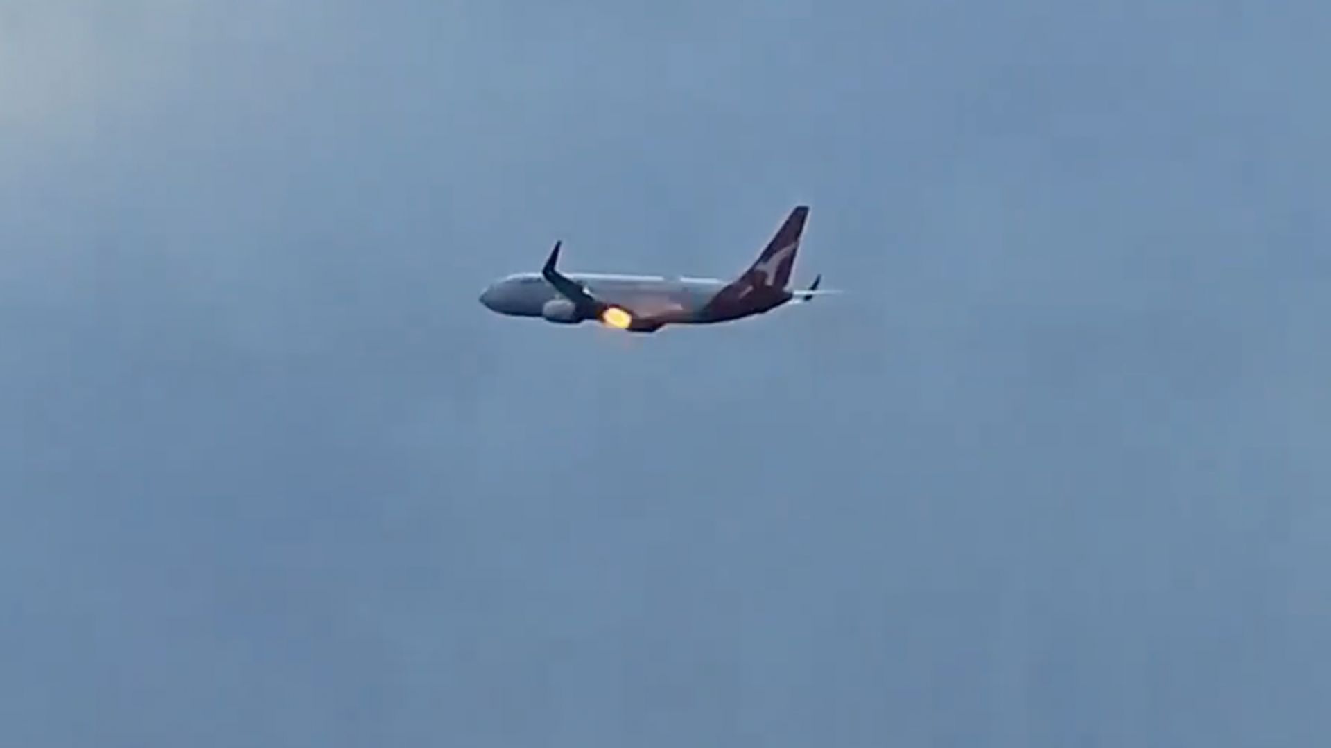 Flames burst from Qantas plane engine after New Zealand takeoff