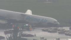 Video shows damaged Amazon cargo plane after crash