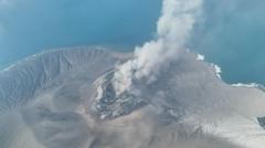 Indonesia airports reopen after volcano eruption leaves 340,000 stranded