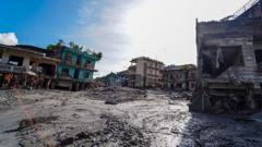 Nepal cracks down on online abuse of flood survivors