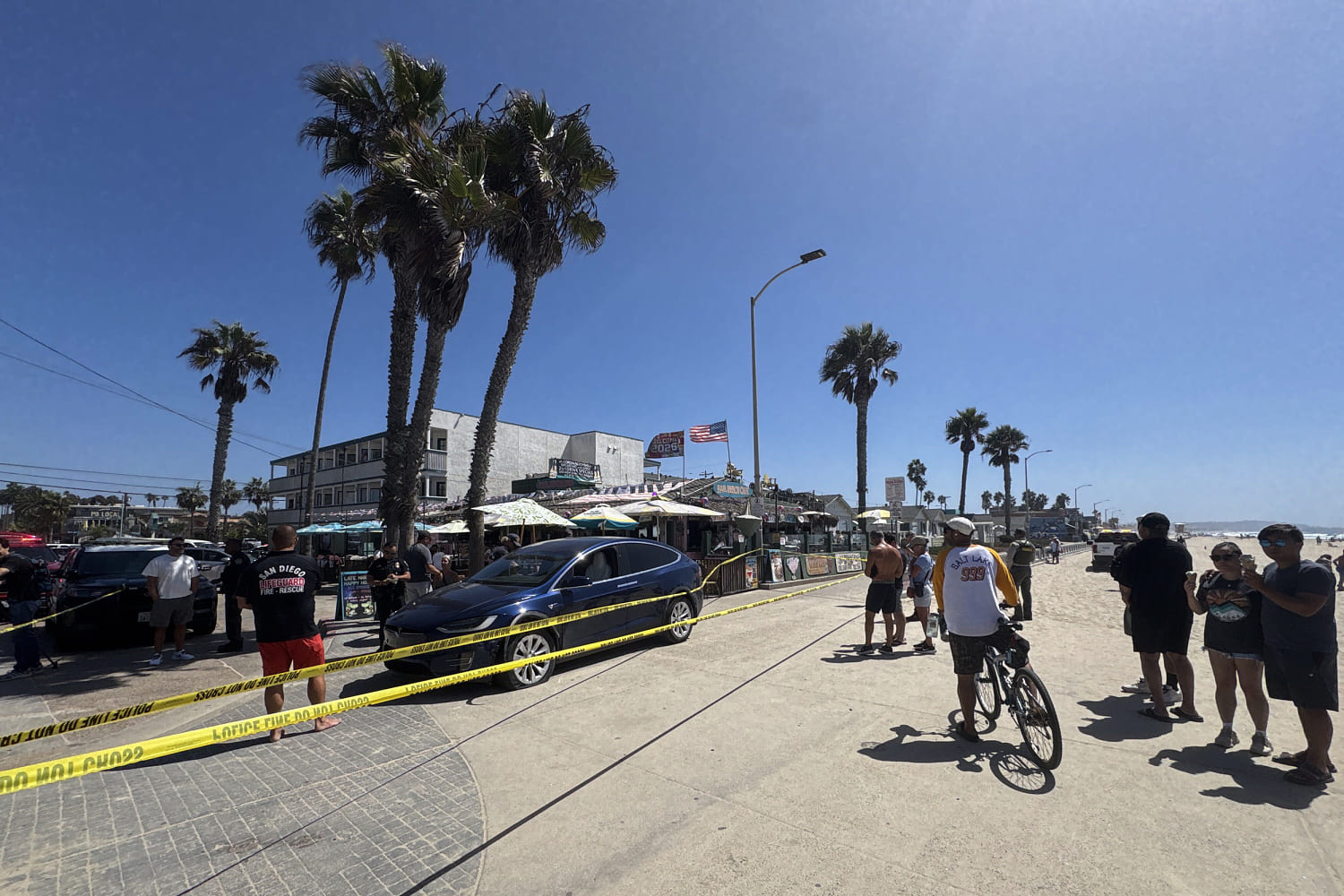 Bystanders chase down man accused of striking woman with stolen car on San Diego boardwalk