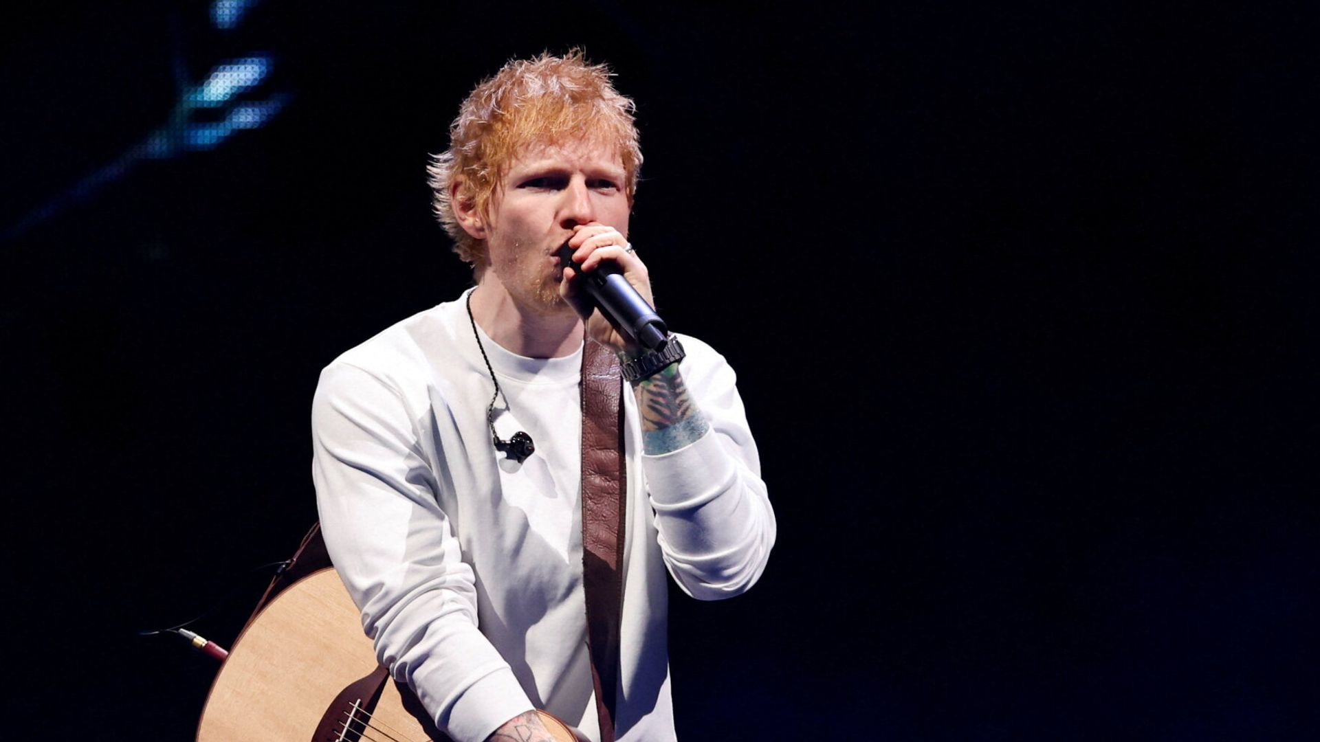 Macklemore announces $1m donation after Sheeran row – as stadium owner responds