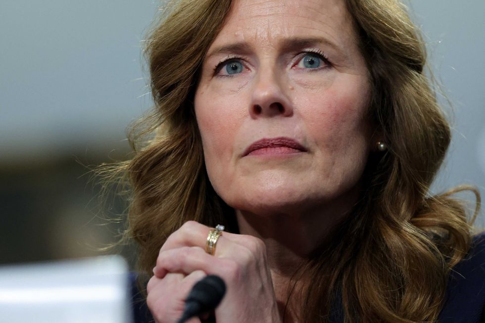 Amy Coney Barrett deflects on Trump threatening justices despite her own warnings