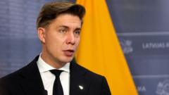 Lithuania ready to ‘fight back’ but has evacuation plans in face of Russia threats, PM tells BBC